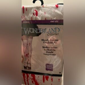 Gothic or Halloween thigh highs. White with blood (package is original & intact